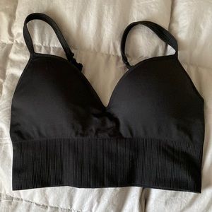 Athleta sports bra that can transition to a everyday bra it is  black and size S